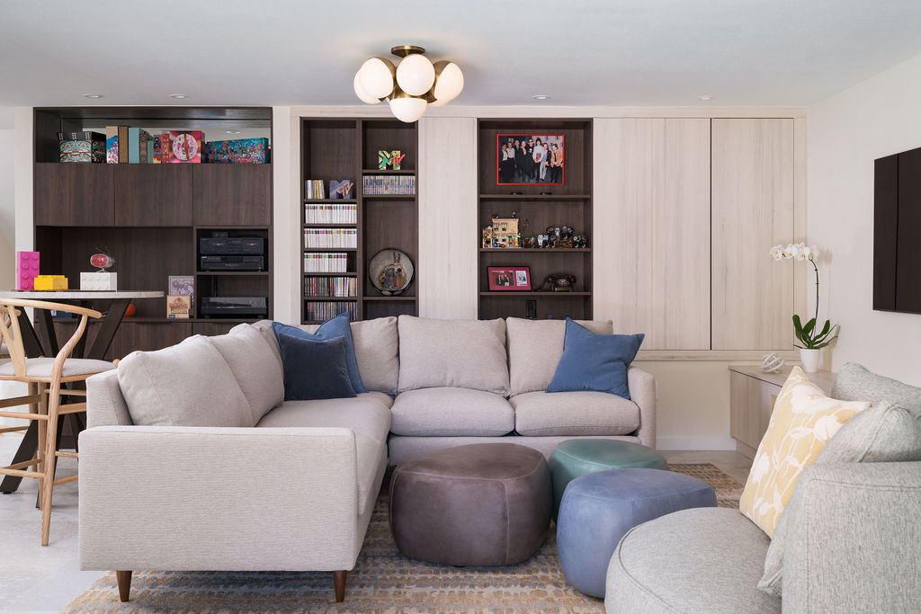 A remodeled basement in Table Mesa neighborhood has sliding paneled cabinet doors.