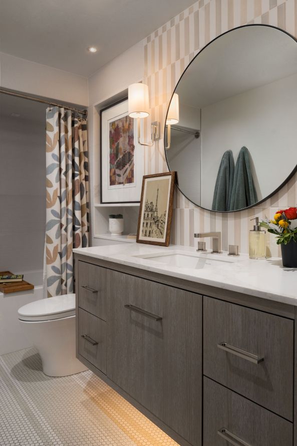Ann Sacks backsplash tile is complimented by custom layout penny tiles in a Boulder full bathroom renovation.